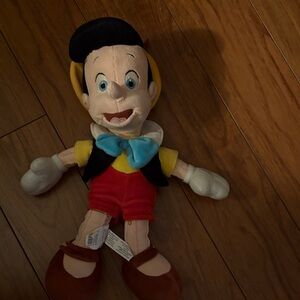 Disney Pinocchio Plush with Red Shorts and Blue Bow
